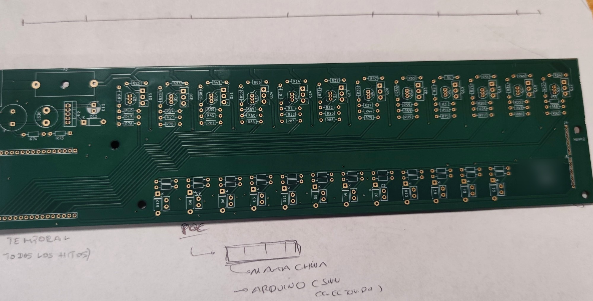 Bare green custom PCB prototype with gold pads and repeating driver footprints